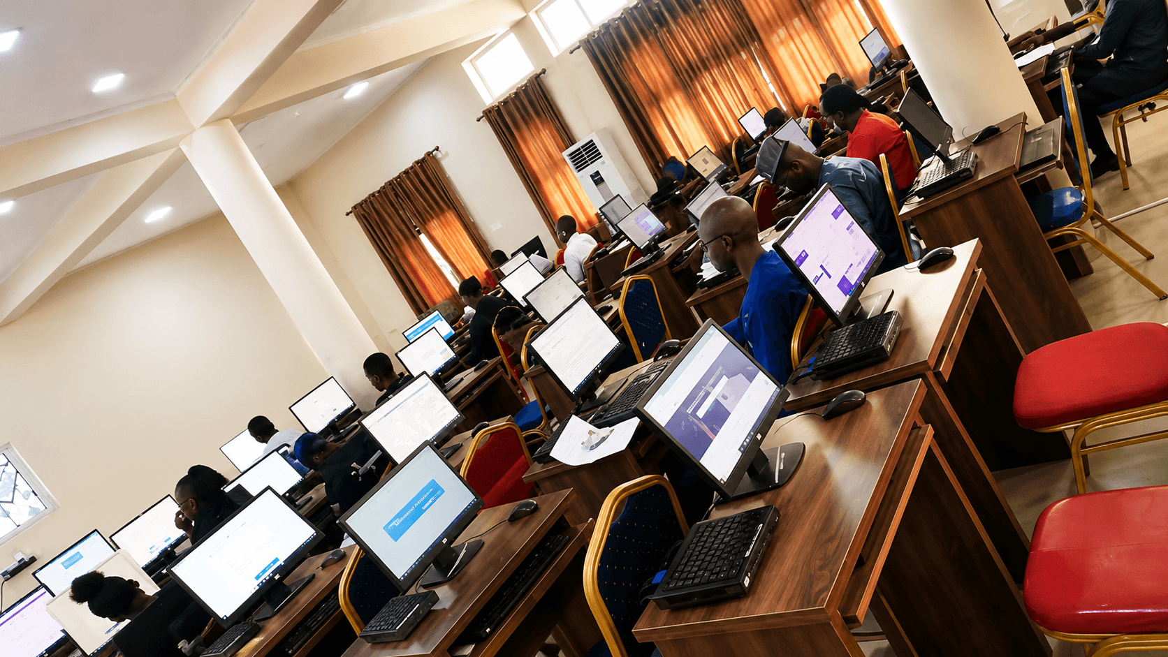 Students using the e-library computer terminals